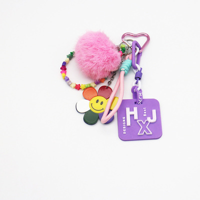 Spot new mi colorful flower pink fur monster pendant accessories car keychain