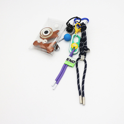 Spot new miu department hand golf ball small monster pendant accessories car keychain