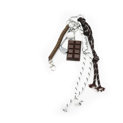Chocolate golf ball spring toy pendant pearl chain string bag charm pendant silicone tag keychain